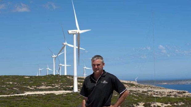 Answer's blowing in the wind ... Mark Cant and wind turbines in South Australia's Eyre peninsula.