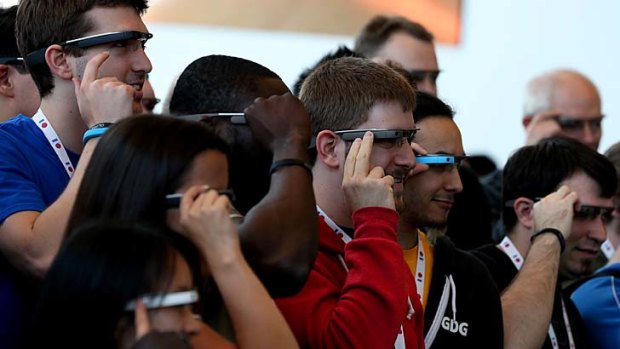 Say cheese: Google I/O attendees pose for a photo wearing Google Glass.
