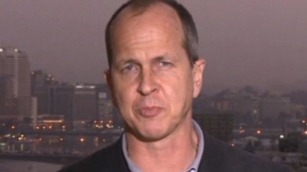 A screen grab from a BBC report by Peter Greste, an Al-Jazeera journalist who was arrested for aiding the Muslim Brotherhood in Egypt.