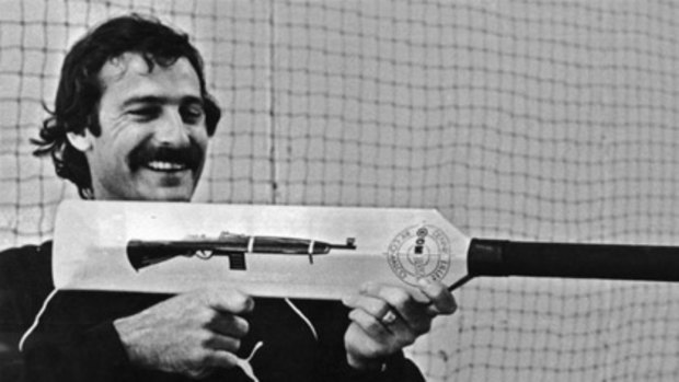 Dennis Lillee brandishes the controversial aluminium bat.