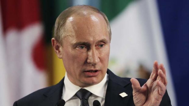 Support ... Russia's President Vladimir Putin has encouraged David Cameron and Barack Obama's move to support allowing Bashar al-Assad safe passage in Britain and the United States.