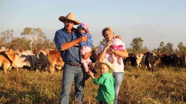 Surviving on their own ... Chris and Marie Muldoon with Jock, 3, Lizzie, 2, and baby Isabella, on their property south of Darwin.