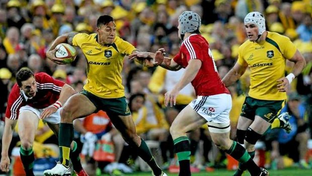Holding off: Israel Folau impressed for the Wallabies against the British and Irish Lions.