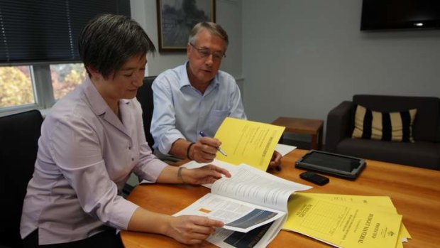 Finance Minister Penny Wong and Treasurer Wayne Swan in the Treasury this weekend, discussing their budget plans.