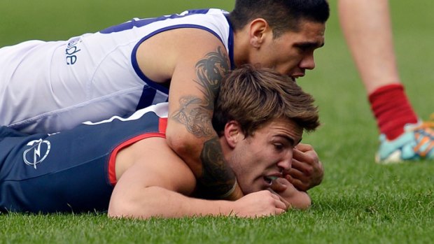 'No such thing as an honourable loss': Fremantle's Michael Walters gets the better of Melbourne's Jack Viney in the Demons' 95-point thrashing.