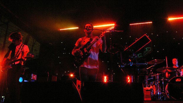 Headliners M83 were booed as they arrived on stage 50 minutes late, but turned it around with <i>Midnight City.</i>