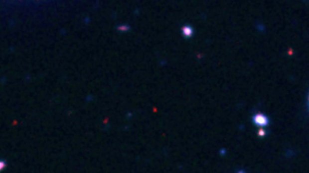 The corner of sky where a team of astronomers say they found the most distant explosion ever detected. The little red dot at the center is the gamma ray burst, estimated by the researchers to be more than 13 billion light years away.