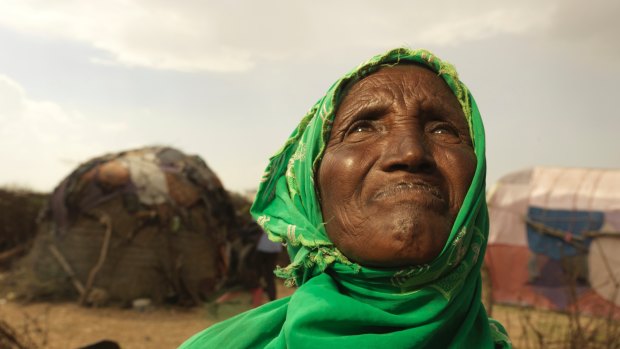 Somali widow Ebada Omer Awad, 55, looks to the heavens last April hoping for rain. Famine was averted in her drought-ravaged region in 2017 but food shortages remain a threat.