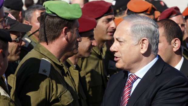 Well done ... Benjamin Netanyahu welcomes back the Israeli army medical team sent to help quake victims in Haiti.