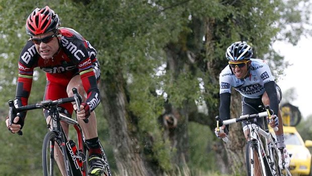 Pressure applied ... Cadel Evans starts gaining time on his rivals on the final descent.