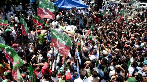 Supporters of Pakistan Tehreek-e-Insaf headed by Pakistan's cricket star-turned-politician Imran Khan  rally in Karachi.
