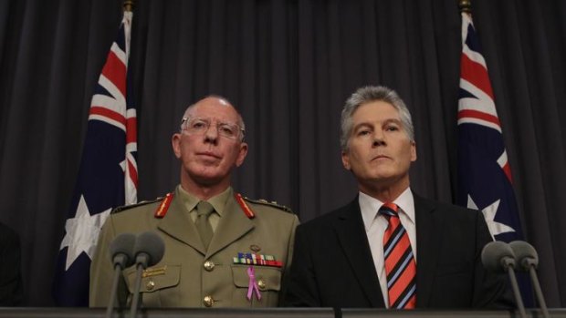 Uncomfortable pair: Defence Force chief David Hurley and Defence Minister Stephen Smith yesterday.