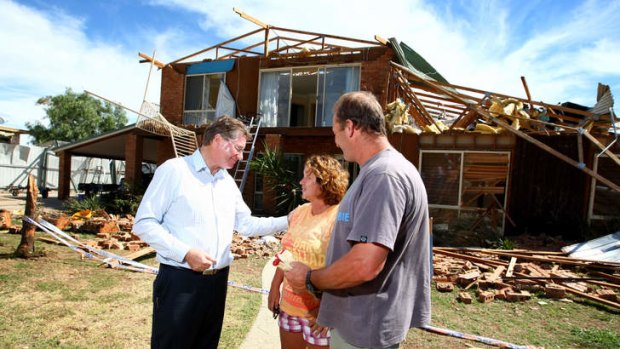 Victorian Premier Denis Napthine meets Leonie and Kelvin Weston-Green at their Bundalong home which was extensively damaged in a tornado.