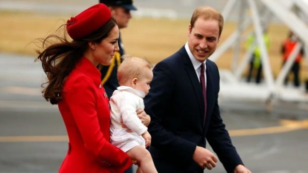 LANDING PAGE: Prince William, his wife Catherine, Duchess of Cambridge and their son Prince George arrive in Wellington.