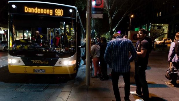 The 980 bus picks up passengers before heading to Dandenong.