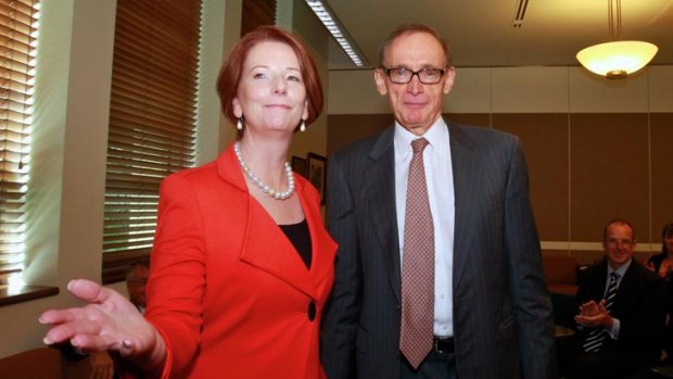 Long introduction ... Prime Minister Julia Gillard welcomed Senator Bob Carr to his first caucus meeting.