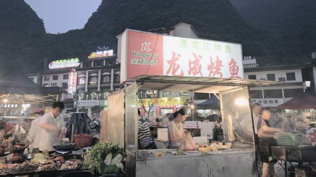 Food stalls under Yangshuo's limestone peaks.