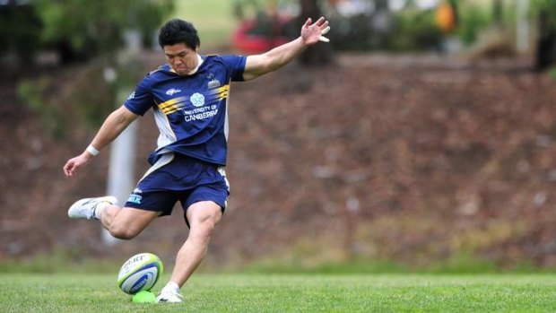 New Brumbies recruit Harumichi Tatekawa practices his kicking during training at the University of Canberra on Thursday.