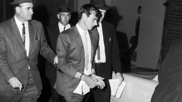 Prison break ... Walker is taken to police headquarters in Sydney after his recapture with Ronald Ryan on 5 January 1966.