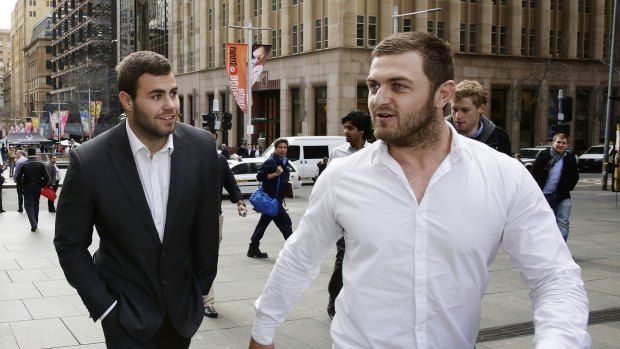 Sharks circling: Wade Graham and Nathan Gardner leave a meeting with their lawyers in Pitt St.