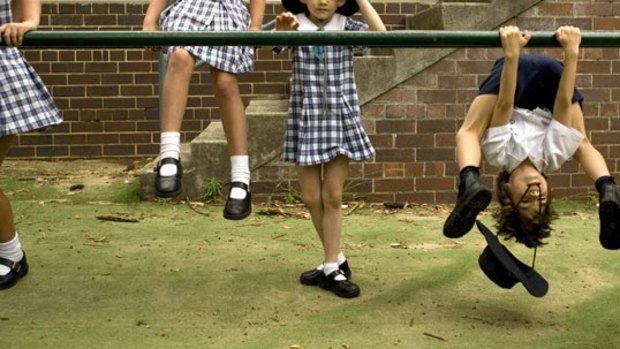 Monkeying around ... children at Galilee Catholic Primary School in Bondi yesterday. An increased reluctance to let children take risks while playing is blocking their development, a wide range of skills, a  study says.