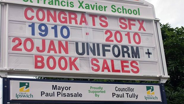 The names of Mayor Paul Pisasale and fellow councillors feature on school signs across Ipswich.