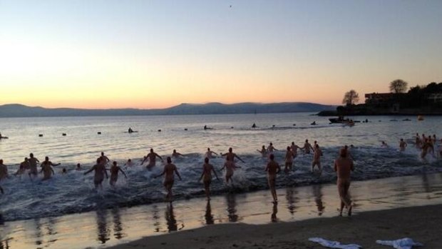 Swimmers hit the icy waters of the Derwent - sans swimmers - for Dark Mofo's solstice nude swim. 