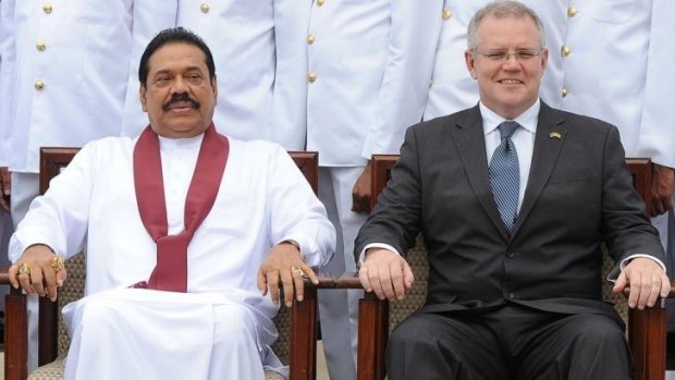 Sri Lankan President Mahinda Rajapaksa (left) with Immigration Minister Scott Morrison in Colombo on Wednesday during a ceremony commissioning two patrol boats given as a gift by Australia. 