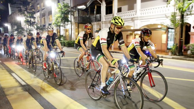 Tony Abbott with a bunch of other cyclists.