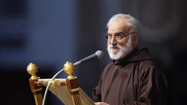 Reverend Raniero Cantalamessa delivers the Good Friday homily during a service celebrated by Pope Benedict XVI  in St. Peter's Basilica at the Vatican.