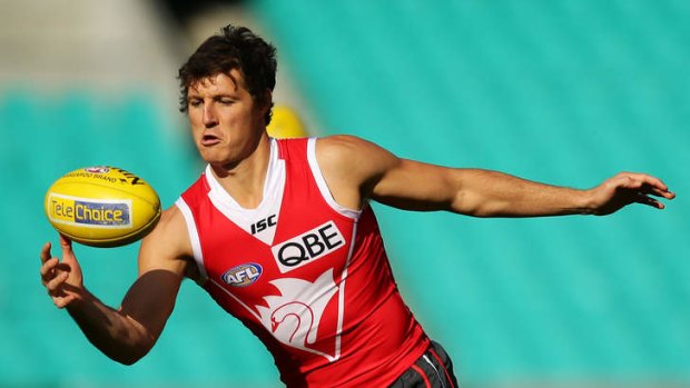 Brushing up: Kurt Tippett trains with the Swans at the SCG on Tuesday.