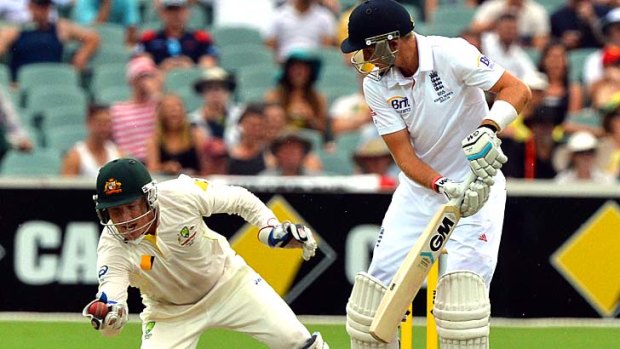Caught out: Australia's wicketkeeper Brad Haddin dives in for a successfull catch of England's batsman Joe Root during day four of the second Test match.