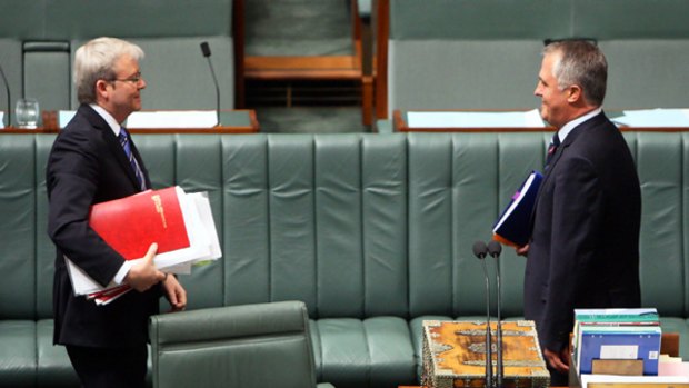 Kevin Rudd faces Malcolm Turnbull in Parliament during a division yesterday.