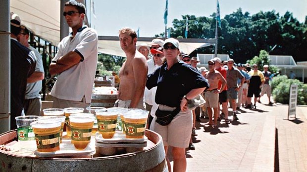 Drinkers on tap: Beer executives say sport fans are a 'natural fit' for their product.