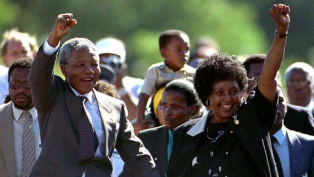 Nelson and Winnie Mandela salute the crowd after his release from prison in February 1990.