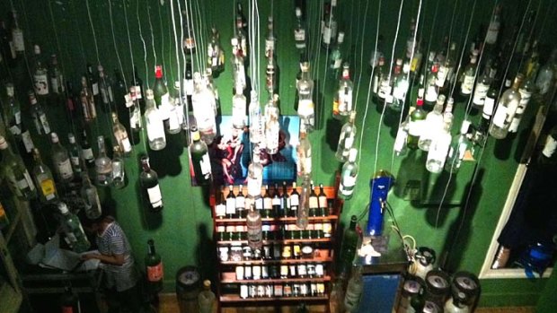 Dangling glass bottles at Bar Betta.