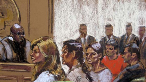 (From left to right) Russian spy suspects, Anna Chapman, Vicky Pelaez, Richard Murphy, Cynthia Murphy and Juan Lazaro, are seen in this courtroom sketch.
