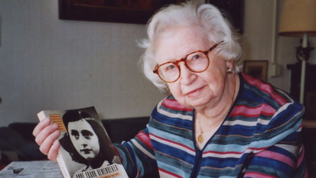 Miep Gies with a copy of her book 'Anne Frank Remembered' .