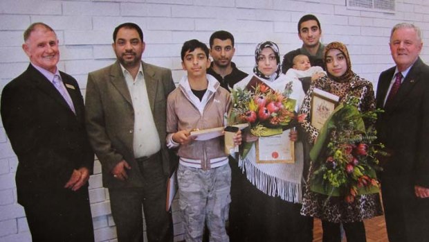 Endured 75 lashes ... Mansor Almaribe (second from left) with his family.