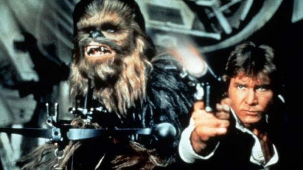 David Prowse as Darth Vader in <i>The Empire Strikes Back</i> (left); Chewbacca (Peter Mayhew) and Han Solo (Harrison Ford) unload (right).