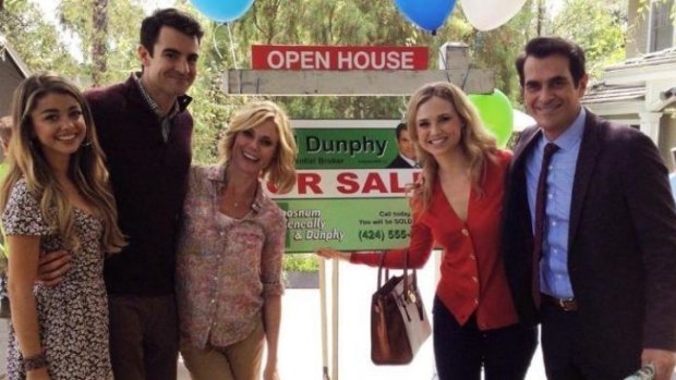 Lookalikes: Ben Lawson, second from left, in a scene from <i>Modern Family</i>.