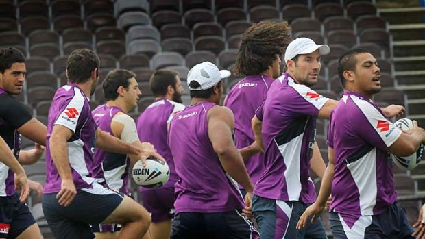 Melbourne Storm players during a training session yesterday.