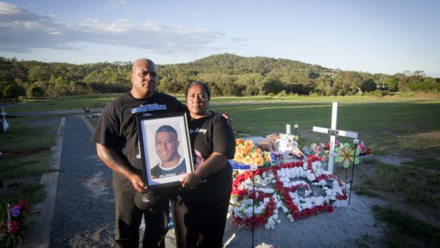 Lest we forget … Mosese Fotuaika's parents, Lisa and Penitani, at his grave.