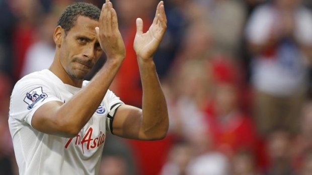 Rio Ferdinand applauds the crowd at Old Trafford when he returned to the ground representing QPR on Sunday.
