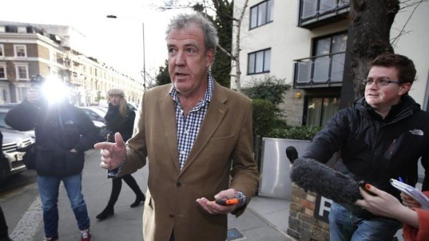 Sacked ... British television presenter Jeremy Clarkson leaves his home in London March 24, 2015. Nearly 450,000 fans from around the world have backed a petition calling for Clarkson to be reinstated to his job hosting the Top Gear after he punched a producer.