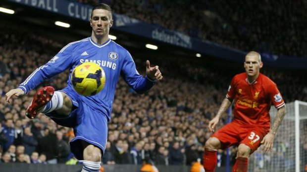 Stretching the budget: A record signing in 2011, Fernando Torres controls the ball against Liverpool at Stamford Bridge on December 29.