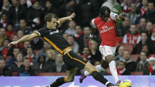Gervinho gave Arsenal an early lead over Wolves.