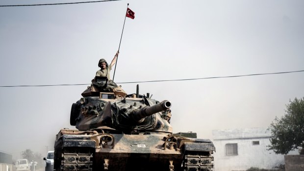 Turkish army tanks near the Syrian border at Karkamis.
