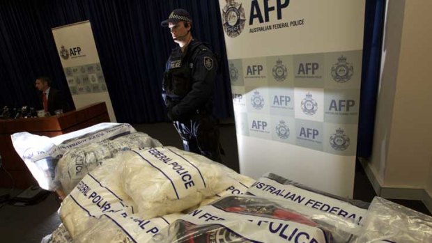 Federal police show off the record haul of methamphetamine in Sydney yesterday.