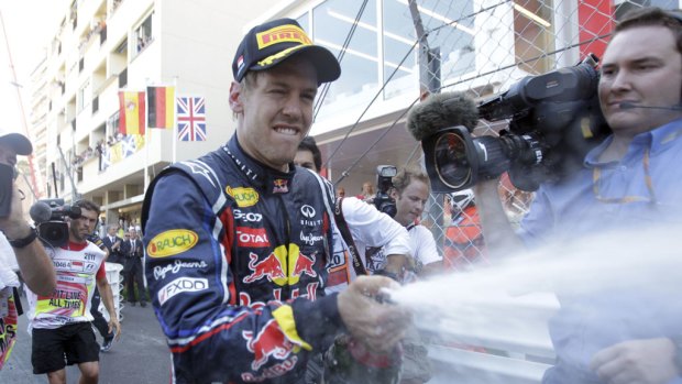 Cause for celebration ... Sebastian Vettel sprays champagne after winning the Monaco Formula One Grand Prix.